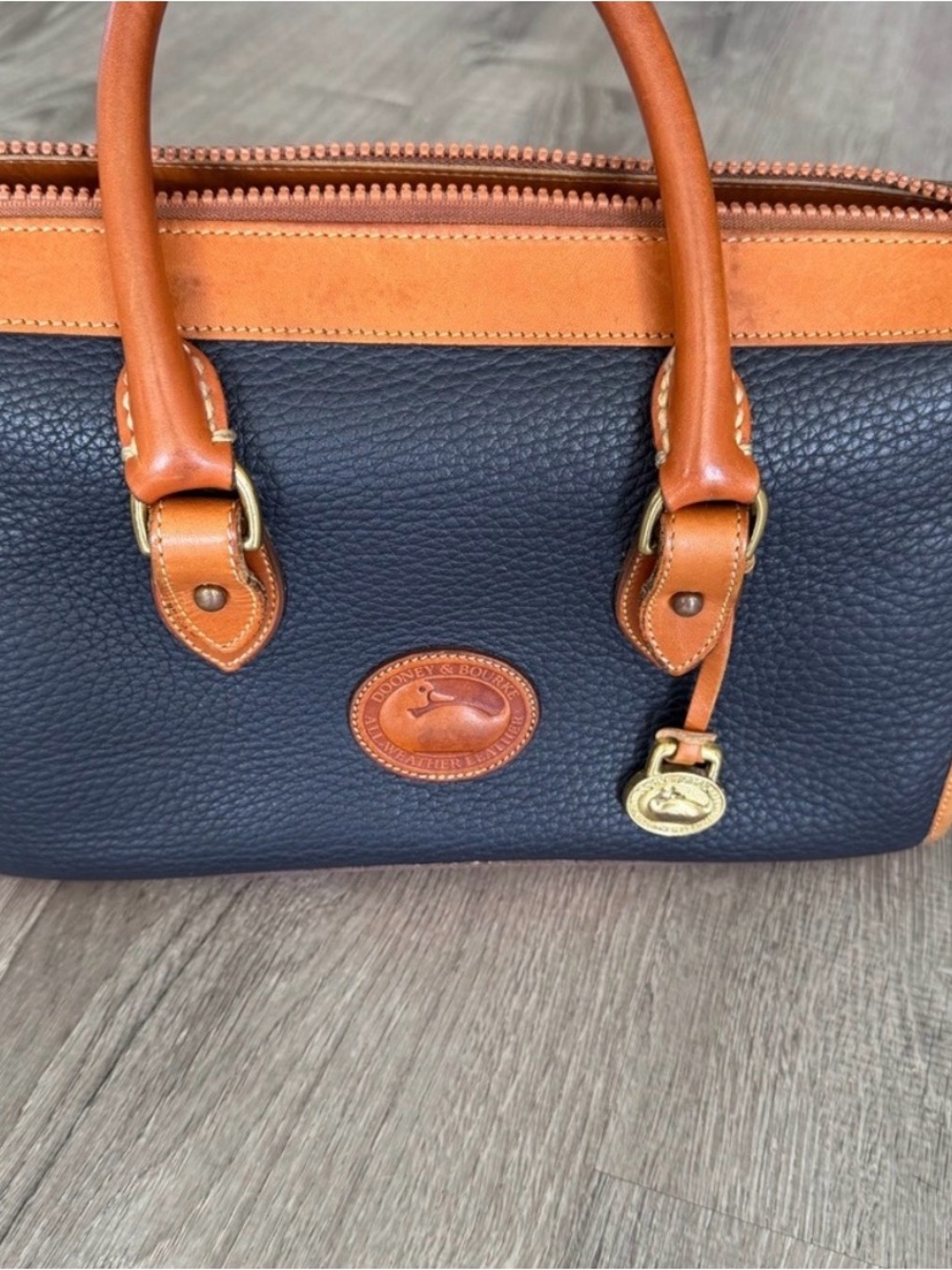 Dooney & Bourke Black Pebble Leather Satchel with Brown Trim